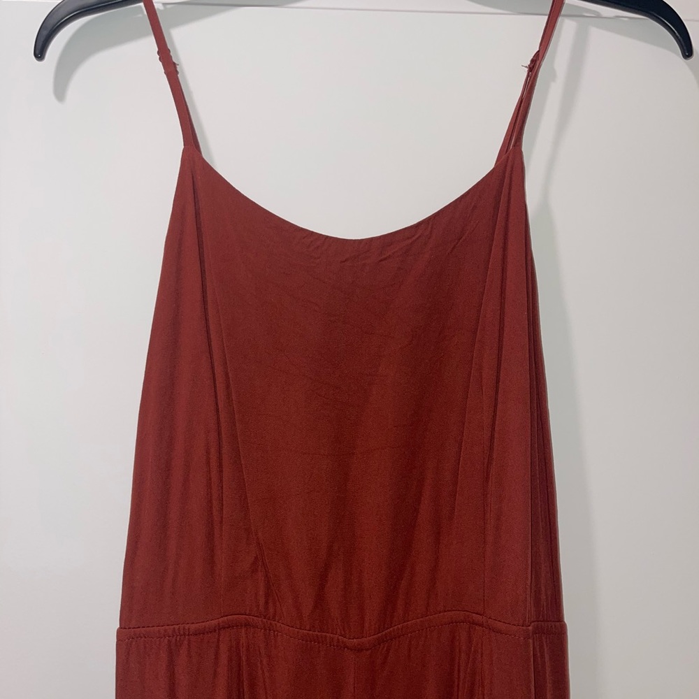 Rust/cider colored jumpsuit with wide leg splits